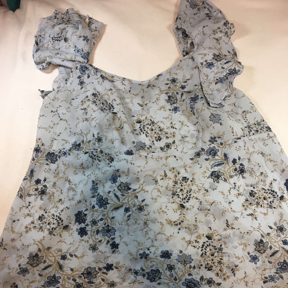 Flutter sleeve sheer floral top